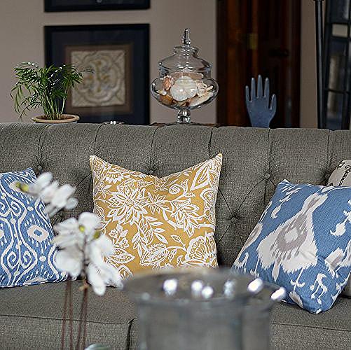 adding color to a neutral great room, home decor, painted furniture, A neutral gray sofa was given a shot of color with some Ikat inspired pillows