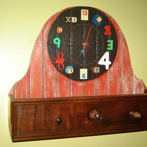 dyi hooked on hooks, repurposing upcycling, Crazy clock and drawer front sits on studio wall