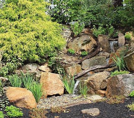 pondless waterfall renovation in northern new jersey, landscape, outdoor living, ponds water features, Entire Pondless in Long Valley NJ This is a dry basin The rock on the left serves as a bench where the owner has coffee in the mornings and relaxes