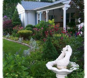 come sit a spell, gardening, outdoor furniture, outdoor living, porches, May view of the porch flowerbeds with roses and peonies in their glory