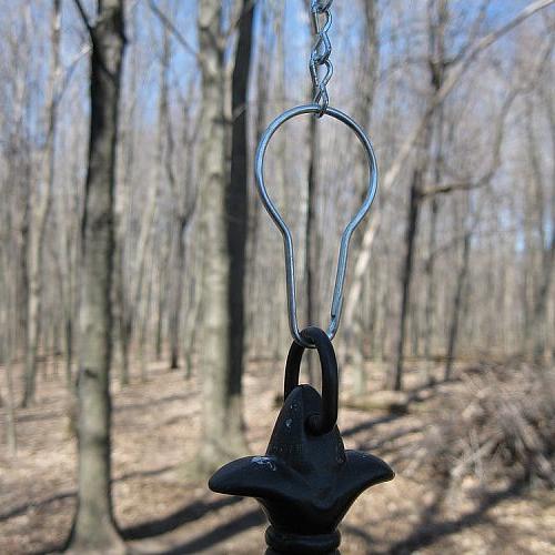 the perfect bird feeder hooks, repurposing upcycling, Threads through the chain and through the loop on any feeder and then locks in place