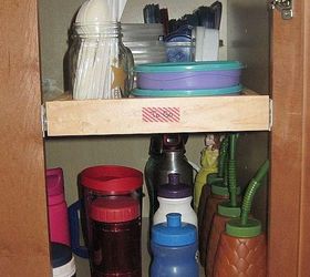 kitchen organization, closet, diy, shelving ideas, storage ideas, woodworking projects, The next cabinet holds smaller plastic containers my husband uses to pack leftovers for work The bottom shelf holds all of our water bottles to go cups