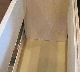 kitchen organization, closet, diy, shelving ideas, storage ideas, woodworking projects, After lowering the shelf Mark cut a piece of wood the width of the shelf nailed it in He actually routed a handle on the front piece