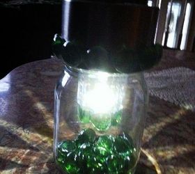 another solar light in a jar, crafts, lighting, This is after glued flat sided gems around the jar ring and around the little edge on the bottom of the clear part of the light This little part was where the cylinder and spike were to put the light into the ground