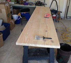 craft room work area table counter top, diy, how to, painted furniture, woodworking projects, Used my little mouse sander to smooth out the boards after the wood filler was dry I used the paint brush to wipe away the sawdust
