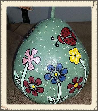 gourds, crafts, I hand painted the designs based on some stencils I had The stencils did NOT work on the rounded sides of the gourds lol Then I outlined a lot of it with a Sharpie to give it clean lines and make it POP