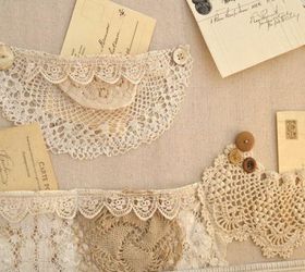 a shabby bulletin board with pockets made of lace and doily s, crafts