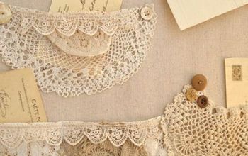 A Shabby Bulletin Board With Pockets Made of Lace And Doily's