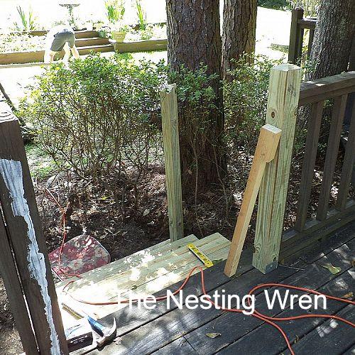 deck trellis, decks, outdoor living, 3 Instead of going to the ground with the upper post we secured it to the decking with a metal bracket The lower post is resting on the ground and secured to the steps The lower post is notched for the trellis frame