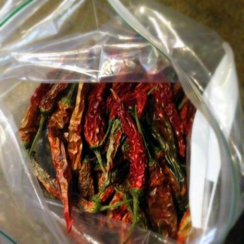 garden pepper spray an all natural alternative to insecticides, gardening, green living, We took some of our previously dried assorted peppers and crushed them up in a bag Jalape o cayenne and other peppers