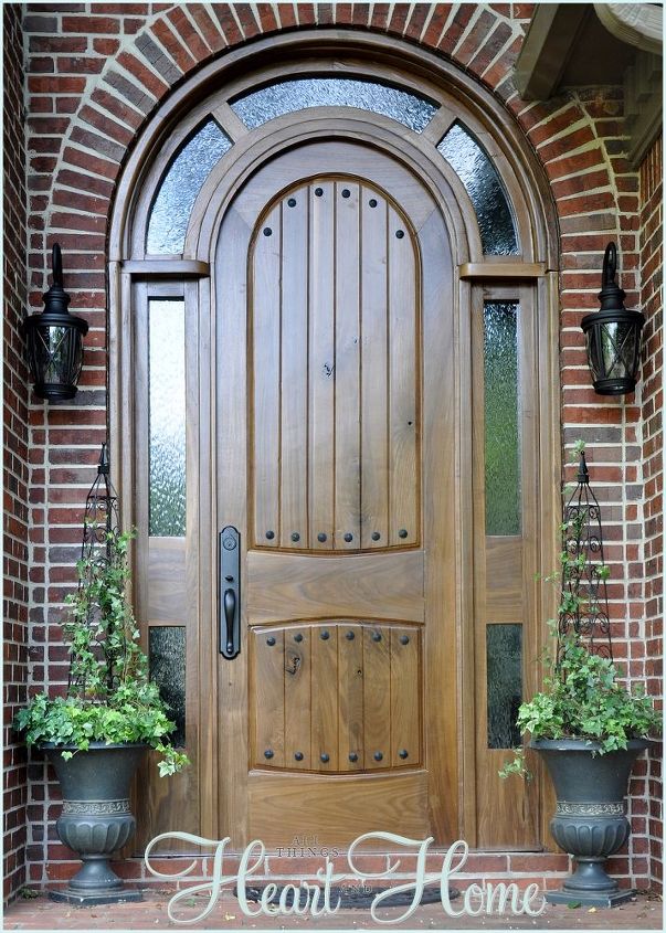 adding rustic clavos to our diy arched tudor door, curb appeal, doors, We added clavos rustic nails to the Tudor door that The Husband made