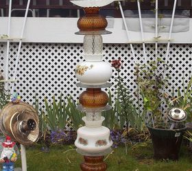 recycled glassware and lamps into garden totems and bird baths, gardening, repurposing upcycling, This one is mostly glass lamp shades and plates with an upside down salt shaker siliconed to the top piece for the bird bath