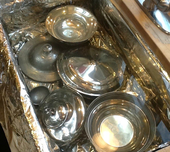 s 10 brilliant things to do before you start spring cleaning, cleaning tips, Buy enough aluminum foil to coat your sink