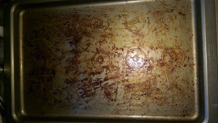 q how to clean a baking sheet, cleaning tips, house cleaning, Baking soda and peroxide did very little to remove the stuck on gunk