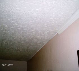 diy styrofoam ceiling tile over water stained popcorn ceiling, Tiles in place Finishing project with Crown Molding