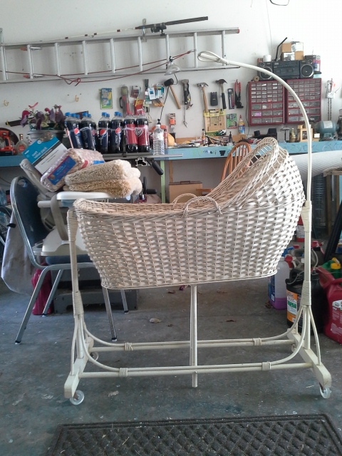 how do you repair vintage wicker, The bassinet sitting on the stand The bar on the bottom middle stops it from rocking