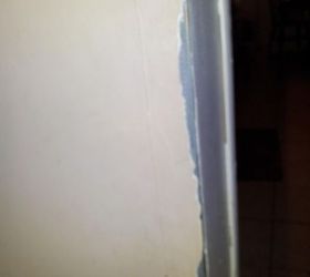 drywall disasters, home maintenance repairs, how to, paint colors, walls ceilings, The worse part of the kitchen doorway the line you see at the back of the opening is the finished wainscotting in the kitchen that wraps around the edge