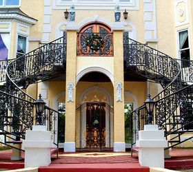 the website that david frohman created for his renovated home in roswell, curb appeal, home decor, This image shows the iron double French staircase as well as both the main entrance above and lower Guest House entrance below as well