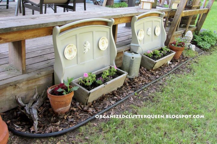 re purposed old college futon arms in the garden, gardening, repurposing upcycling, I just painted them gray set them behind cedar planters and decorated them with cherubs and plates