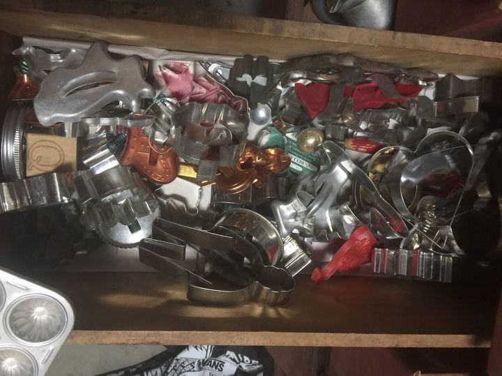 does anyone have an idea for storing or displaying old cookie cutters, One pile