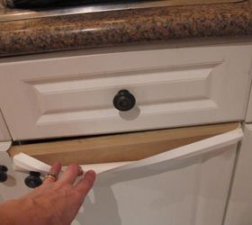 How do you paint laminate kitchen cupboards when they're peeling?