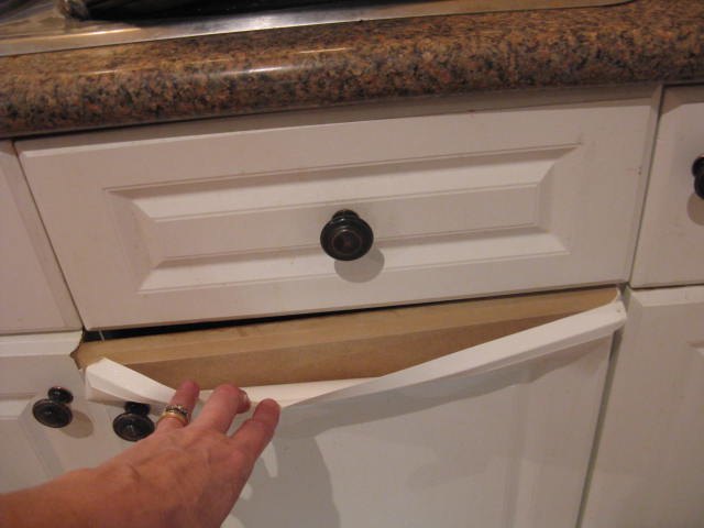 How do you paint laminate kitchen cupboards when they re 