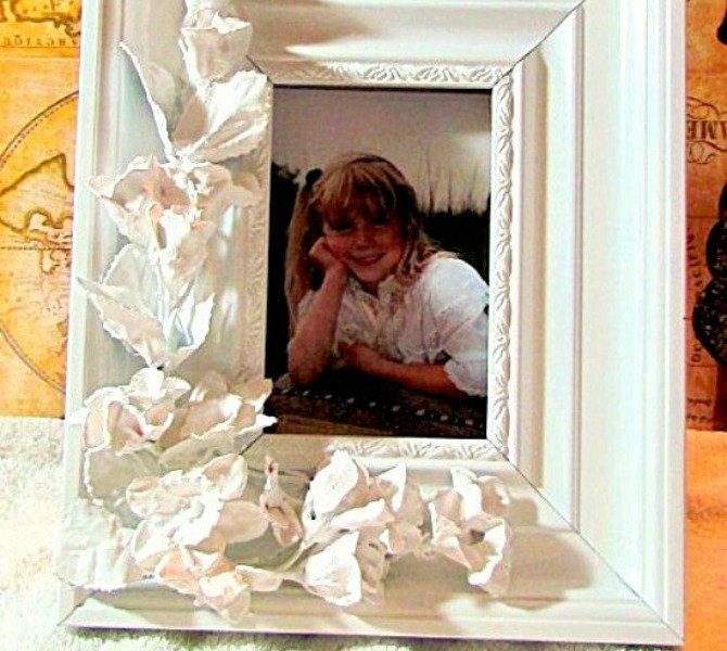 s 23 awesome things you didn t know you could do with old picture frames, crafts, repurposing upcycling, Add artificial flowers for a porcelain look