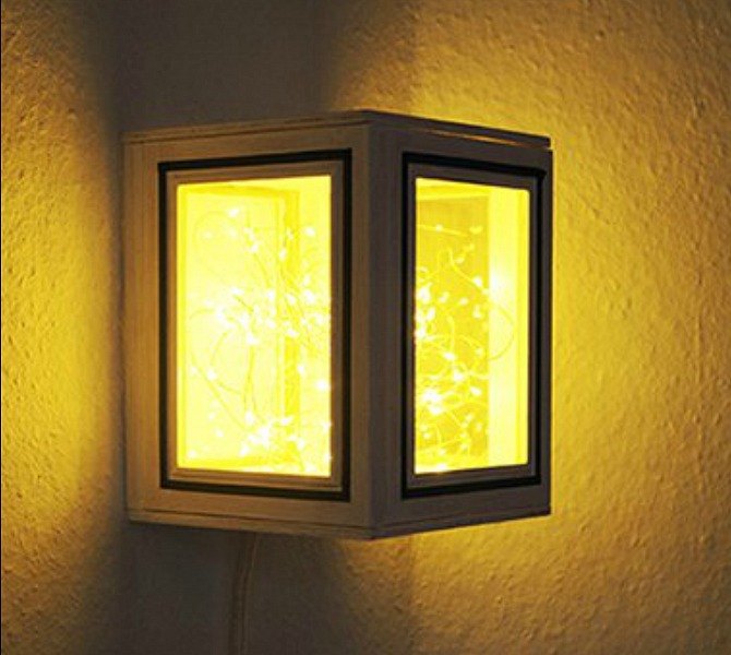 s 23 awesome things you didn t know you could do with old picture frames, crafts, repurposing upcycling, Build a glowing wall lamp