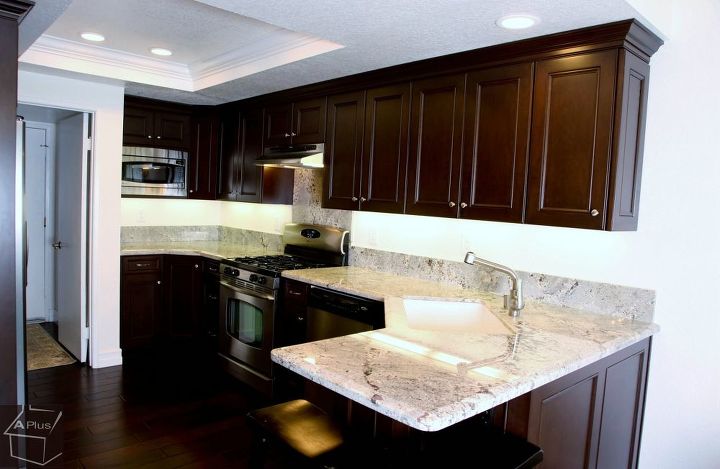 kitchen remodel with custom dark brown cabinets