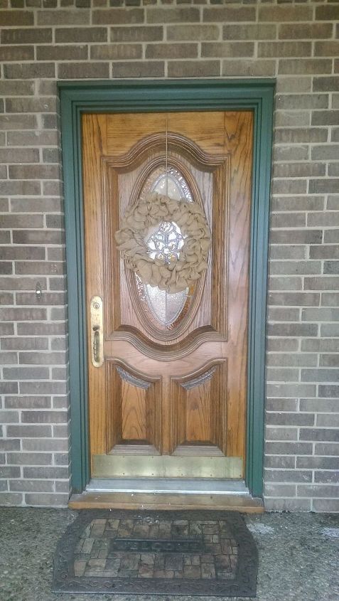 q looking for suggestions on how to update this front door, bug extermination, cosmetic changes, curb appeal, doors, home improvement, painting, The glass in the door has yellow clear colored glass pieces in it Door handle and kickplate will be changed to ORB It s a heavy nice wood door