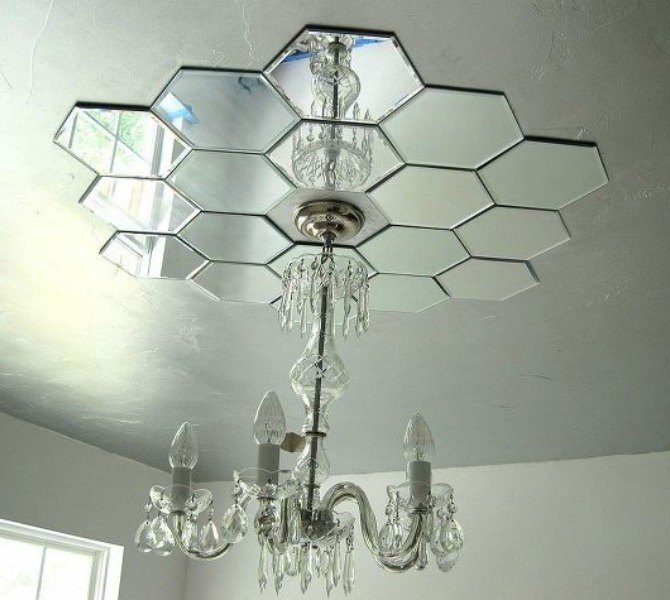 s 15 expensive looking lighting ideas that might surprise you, lighting, repurposing upcycling, Surround a fixture with a mirror medallion