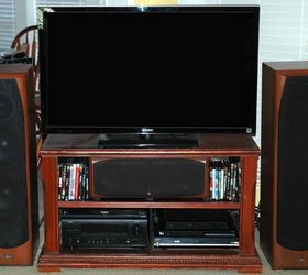 should we refinish the mantel so that the everything matches, Front view of Audio Video cabinet and tower speakers