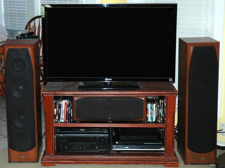 should we refinish the mantel so that the everything matches, Front view of Audio Video cabinet and tower speakers