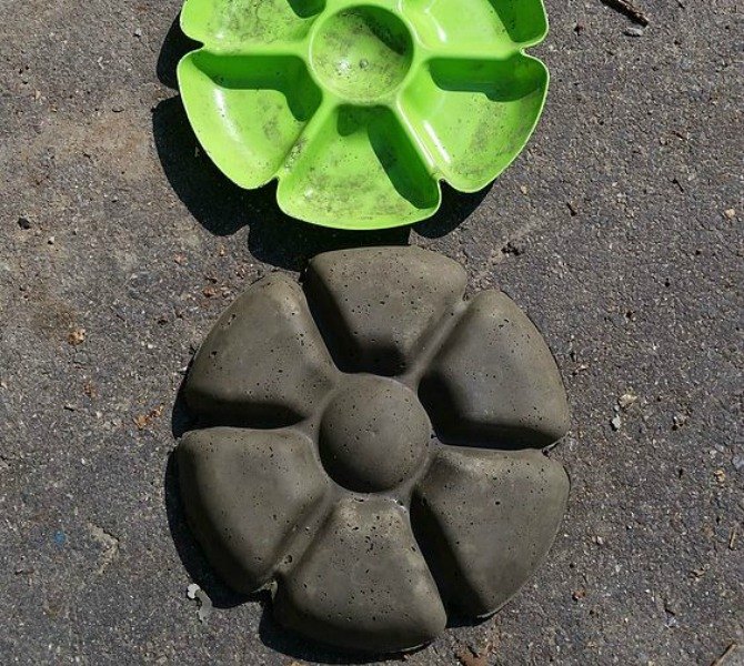 s 17 amazing garden features we ve been saving for summer, gardening, outdoor living, ponds water features, A colorful flower from Dollar Store dishes