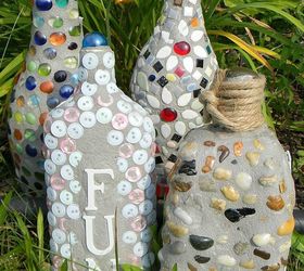 s 17 amazing garden features we ve been saving for summer, gardening, outdoor living, ponds water features, These mosaic designs from old wine bottles
