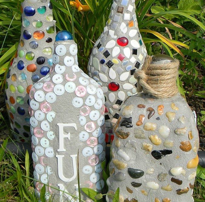 s 17 amazing garden features we ve been saving for summer, gardening, outdoor living, ponds water features, These mosaic designs from old wine bottles