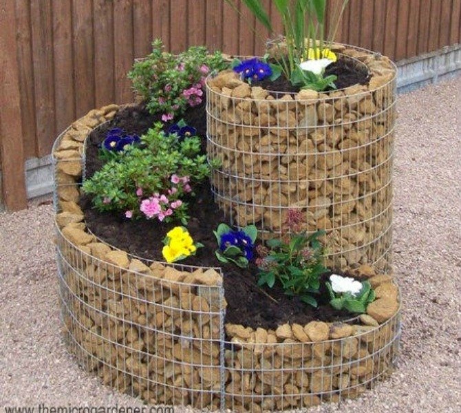 s 17 amazing garden features we ve been saving for summer, gardening, outdoor living, ponds water features, This compact spiral garden