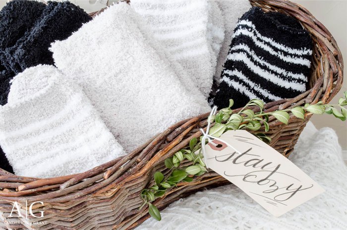 keep a basket of socks for your guests to wear when they visit, home decor