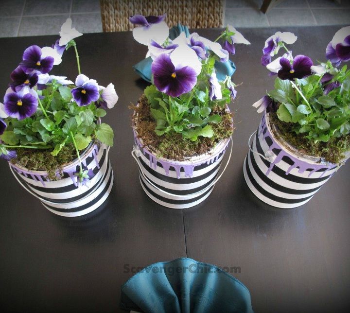 s 13 planter ideas that blow all other planters out of the water, container gardening, gardening, repurposing upcycling, Turn empty paint cans into cute flower pots