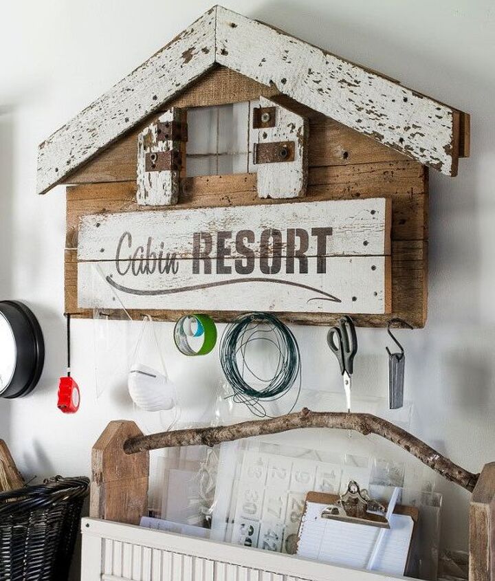 a rustic office on a wall thanks to a few old signs home office repurposing upcycling wall decor