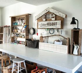 a rustic office on a wall thanks to a few old signs, home office, repurposing upcycling, wall decor, woodworking projects