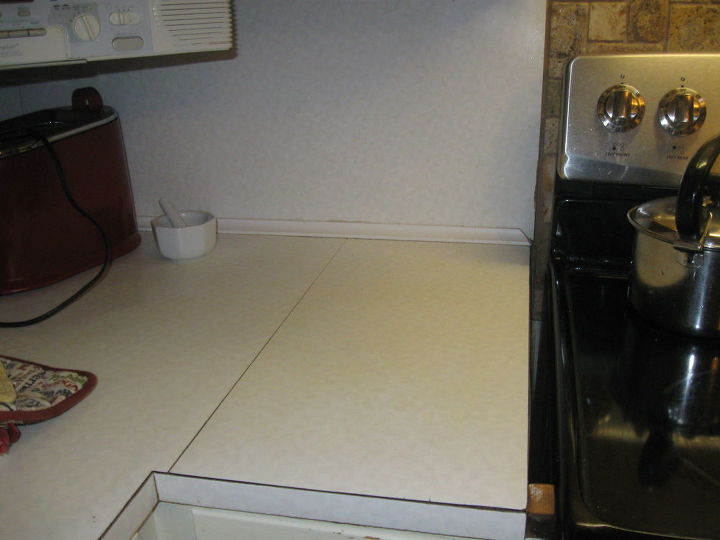 i want to cover up or paint my old formica counter tops in the kitchen, These counter tops are the old white Formica ones with marbling look
