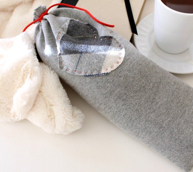 s 15 reasons not to trash your ugly worn out sweaters, crafts, repurposing upcycling, Turn a sweater sleeve into a soft heating pad