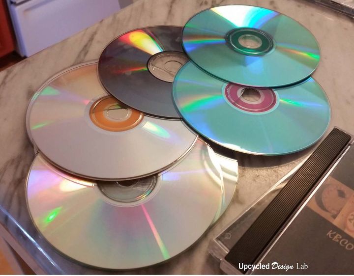 adicione um pouco de brilho sua mesa placemats de cd reciclados