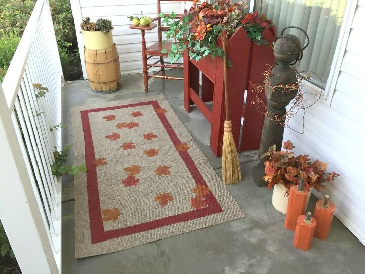 13 expensive looking outdoor rug ideas that cost less than 20, Stencil a playful graphic with craft paint