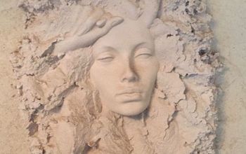  Como posso limpar a arte da areia?