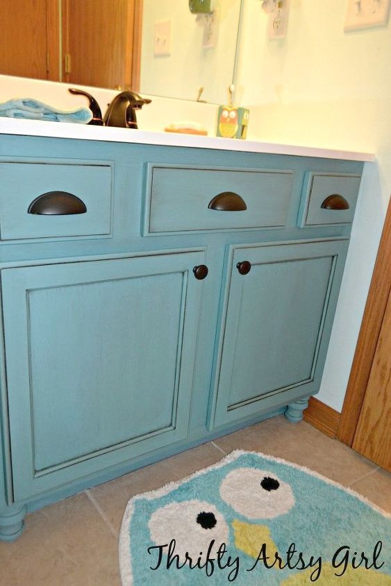 11 low cost ways to replace or redo a hideous bathroom vanity, Add new hardware feet to your old vanity