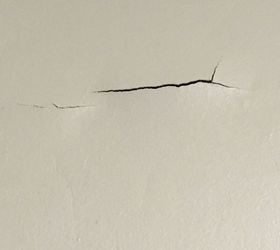 paint peeling fix on a budget what would you do, Wall split