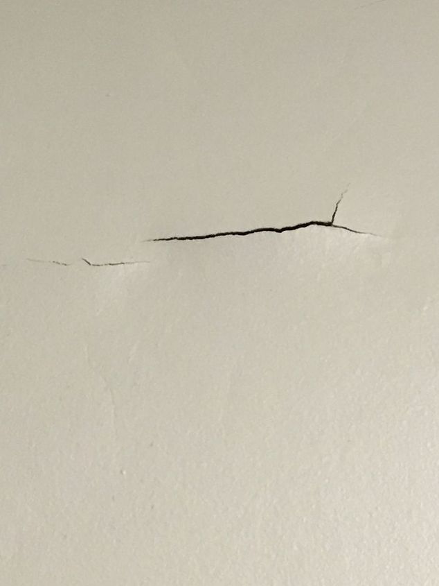 paint peeling fix on a budget what would you do, Wall split