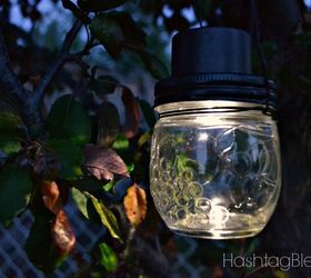 s 13 spectacular things to make for your yard using 1 solar lights, lighting, outdoor living, repurposing upcycling, Some simple luminaries to hang in your trees